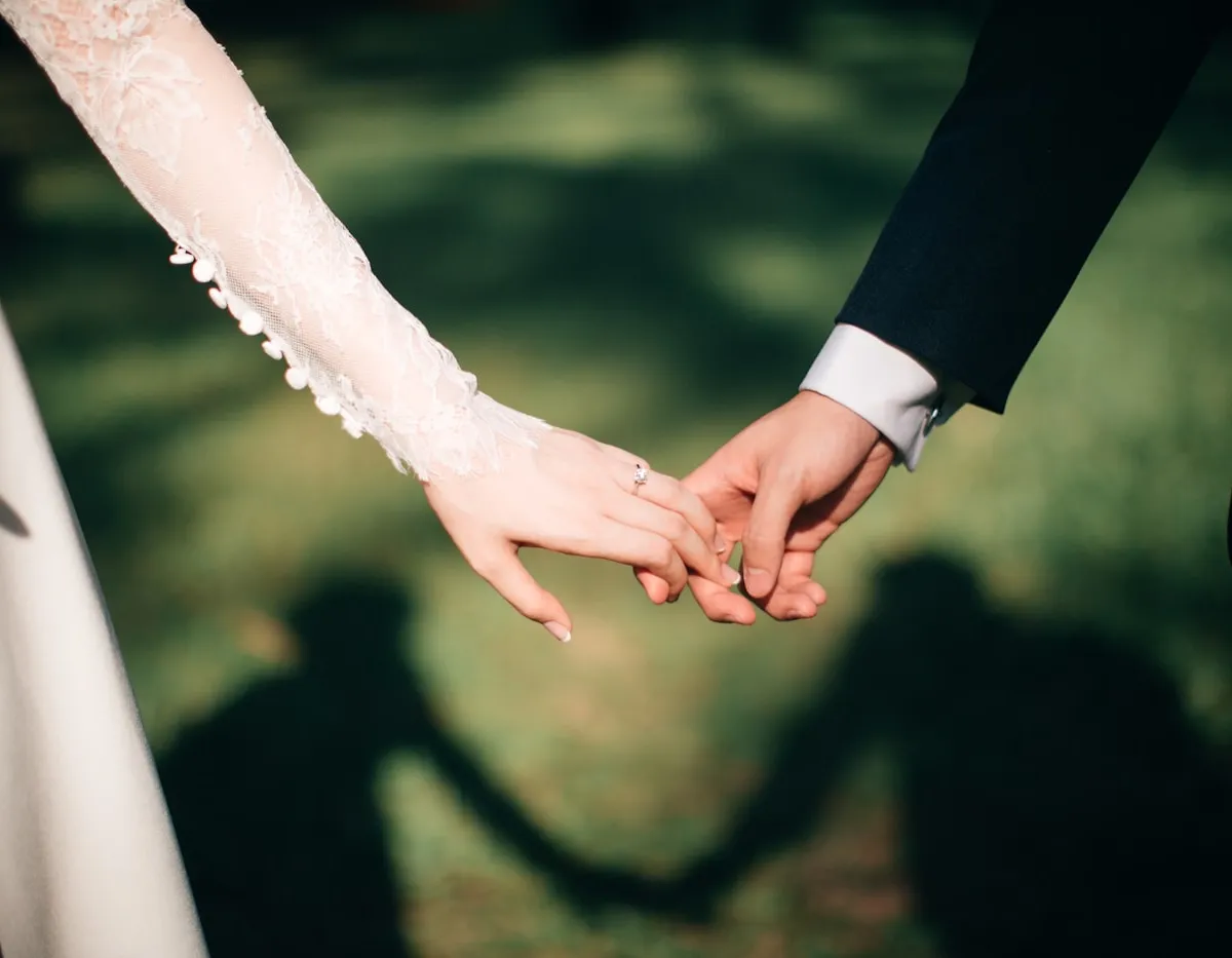 Wedding rings and detail flat lay